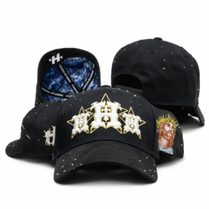 Black baseball cap with gold “H” logo, Jesus crown embroidery, and rhinestone accents on white background.