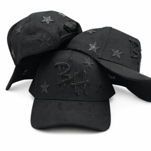 Black baseball cap with beaded “BH” logo and embroidered stars on white background.