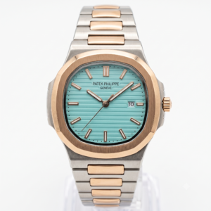 Front view of a two-tone rose gold and silver wristwatch with a textured turquoise dial
